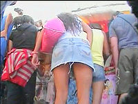 When the girl in jeans skirt was trying to make her way through the press I succeeded to record her hot upskirt!