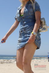 Blonde in denim mini spyed. Lifting up skirts